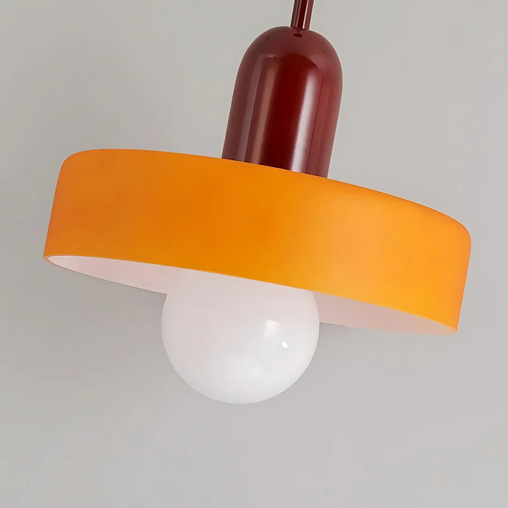 "Modern glass pendant light with sleek glass, brushed metal, ideal for elegant interiors, adds sophistication and warmth."