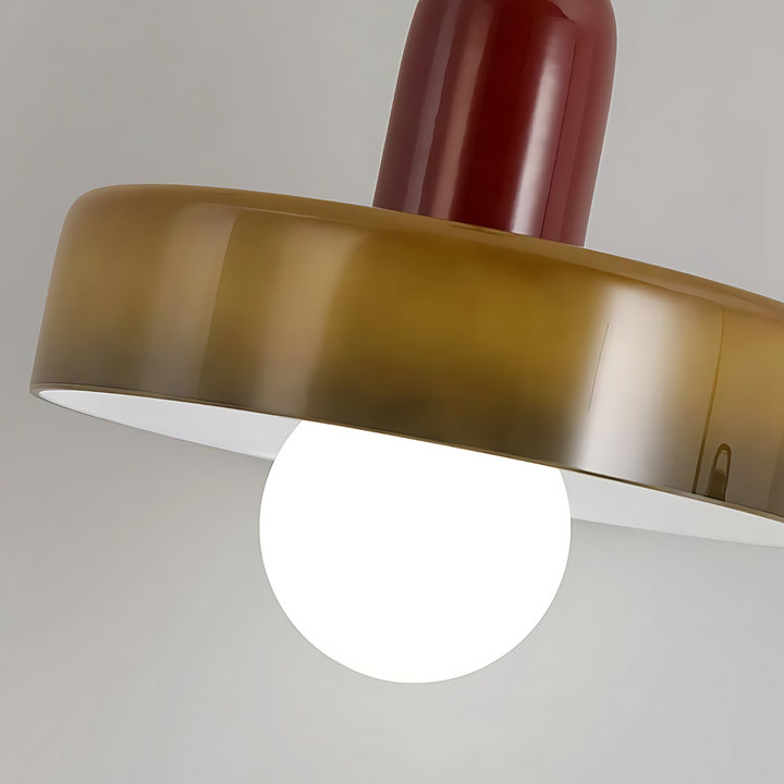 "Modern glass pendant light with sleek glass, brushed metal, ideal for elegant interiors, adds sophistication and warmth."