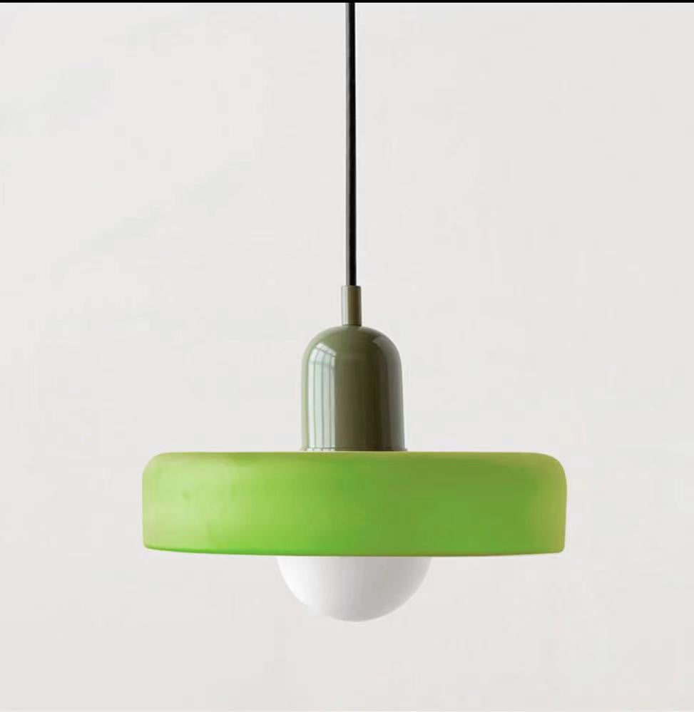 "Modern glass pendant light with sleek glass, brushed metal, ideal for elegant interiors, adds sophistication and warmth."