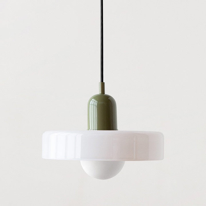 "Modern glass pendant light with sleek glass, brushed metal, ideal for elegant interiors, adds sophistication and warmth."