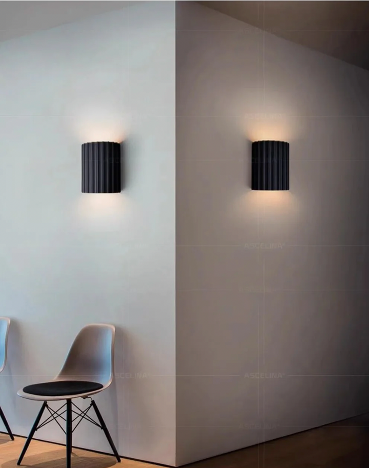 Modern resin wall lamp with artistic design, soft LED lighting, in white, green, grey, or orange for stylish home decor.