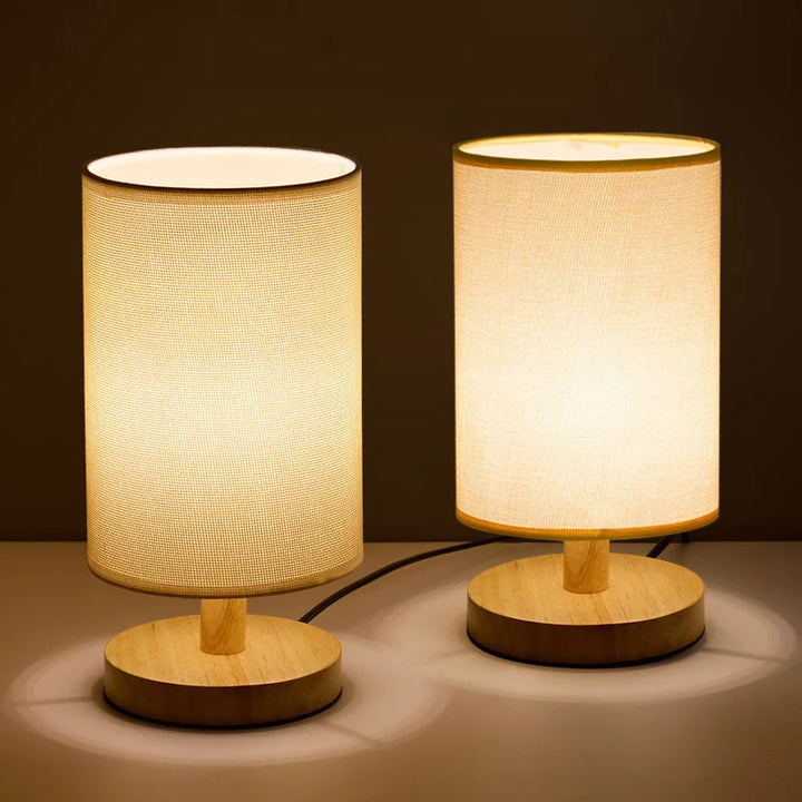 "Modern wooden bedside table lamp with remote, dimmable LED, natural wood look, elegant design for bedroom or living room."
