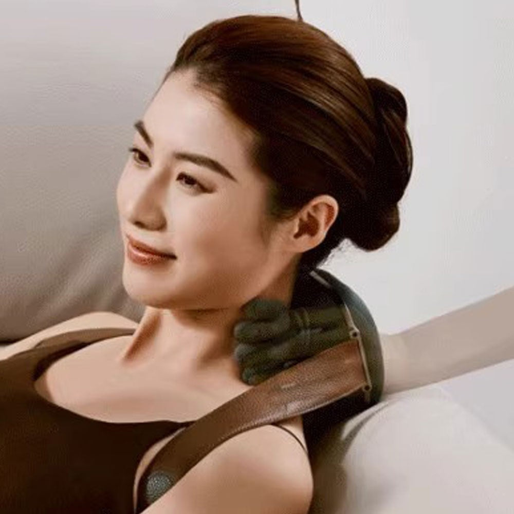 Moss Green neck and shoulder massager, ergonomic design, deep-kneading action, soothing heat therapy, adjustable settings.