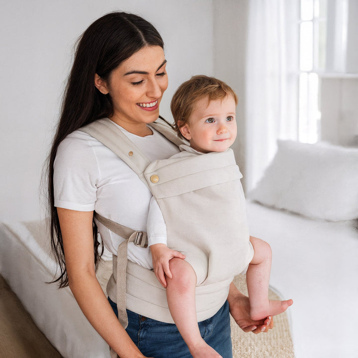 Multi-position baby carrier with plush straps in breathable fabric, for front or back carrying, fits babies 3.2-20 kg.