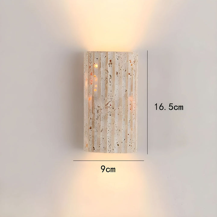 "Natural stone wall lamp with warm LED glow, showcasing organic texture and ambient lighting for modern interiors."