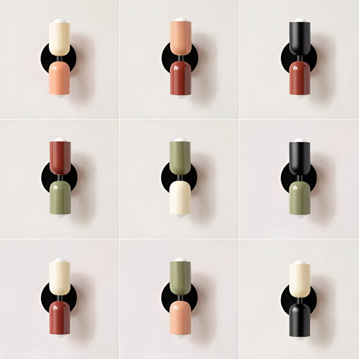 Nordic colourful double head wall light in vibrant colors, painted iron, sleek cylindrical design, casts light up and down.