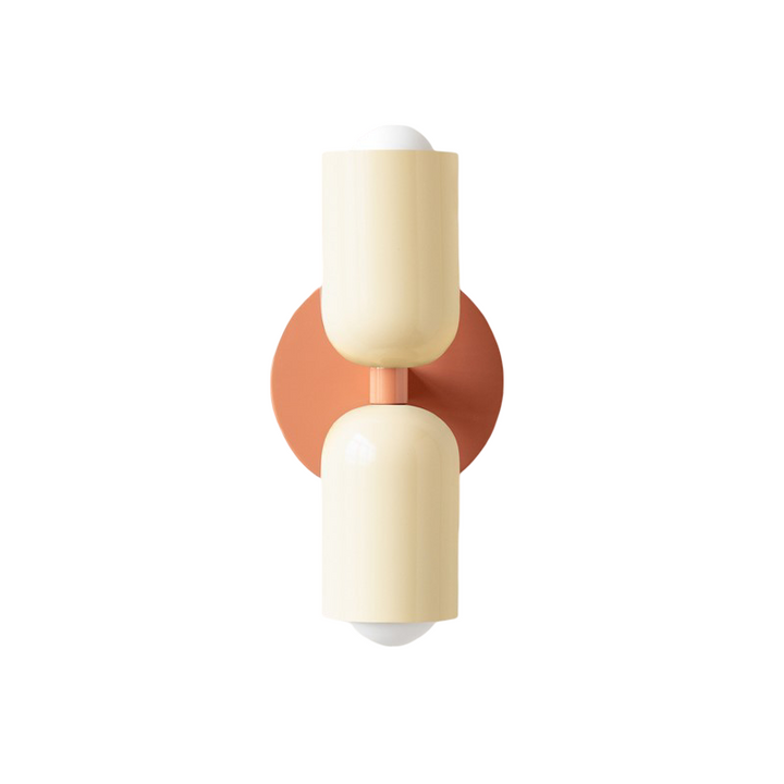 Nordic colourful double head wall light in vibrant colors, painted iron, sleek cylindrical design, casts light up and down.
