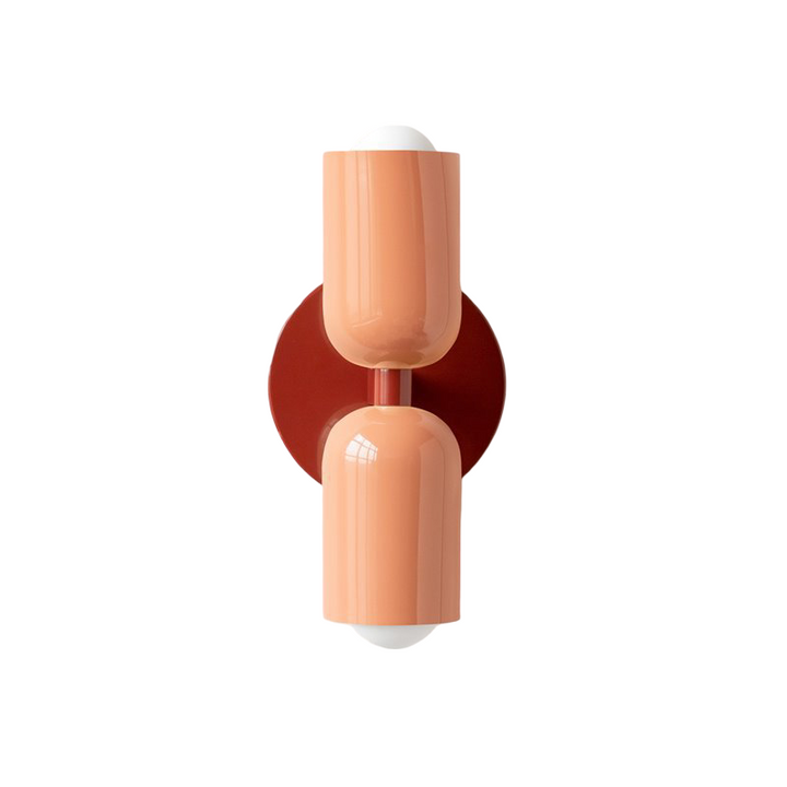 Nordic colourful double head wall light in vibrant colors, painted iron, sleek cylindrical design, casts light up and down.