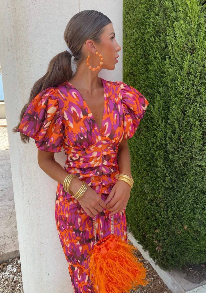 Orange, pink, and purple V-neck bodycon dress, front view, women's elegant silhouette, soft fabric. Perfect for any occasion.