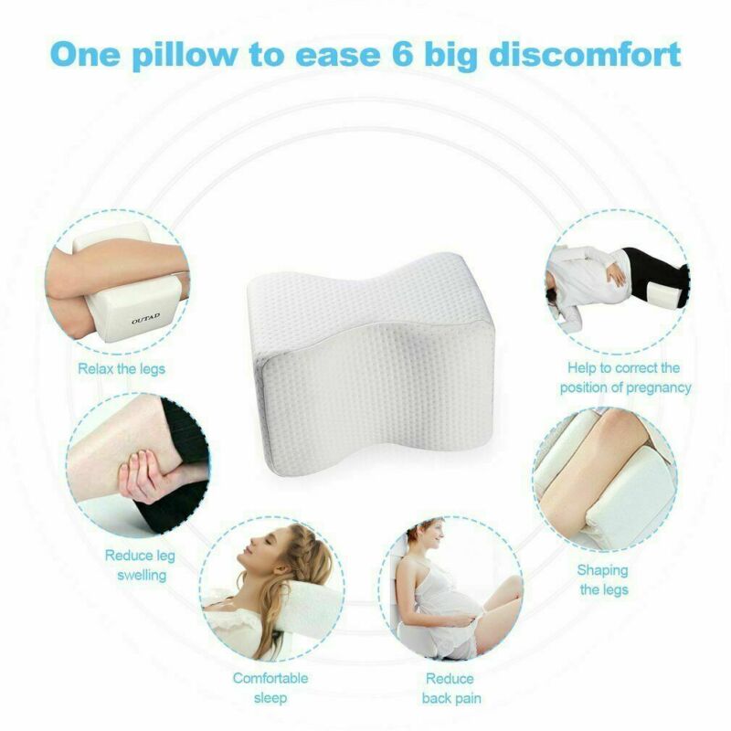 Orthopaedic cushion, white memory foam, ergonomically contoured for hip, knee, and back pain relief, size 24x21x14.5 cm.