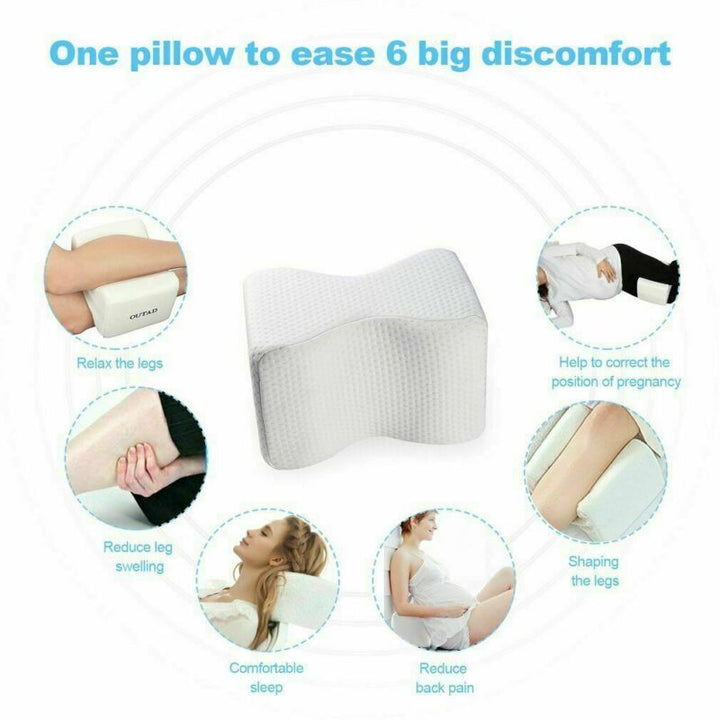 Orthopaedic cushion, white memory foam, ergonomically contoured for hip, knee, and back pain relief, size 24x21x14.5 cm.
