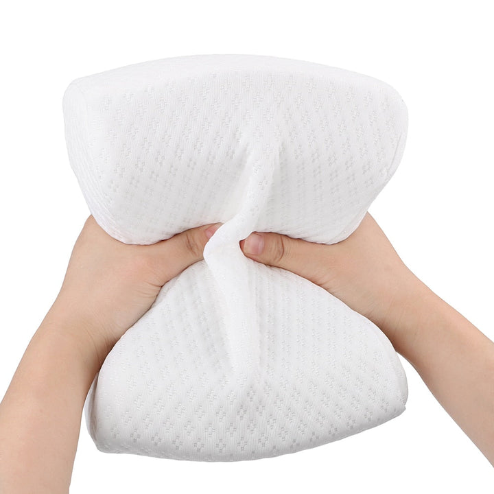 Orthopaedic cushion, white memory foam, ergonomically contoured for hip, knee, and back pain relief, size 24x21x14.5 cm.