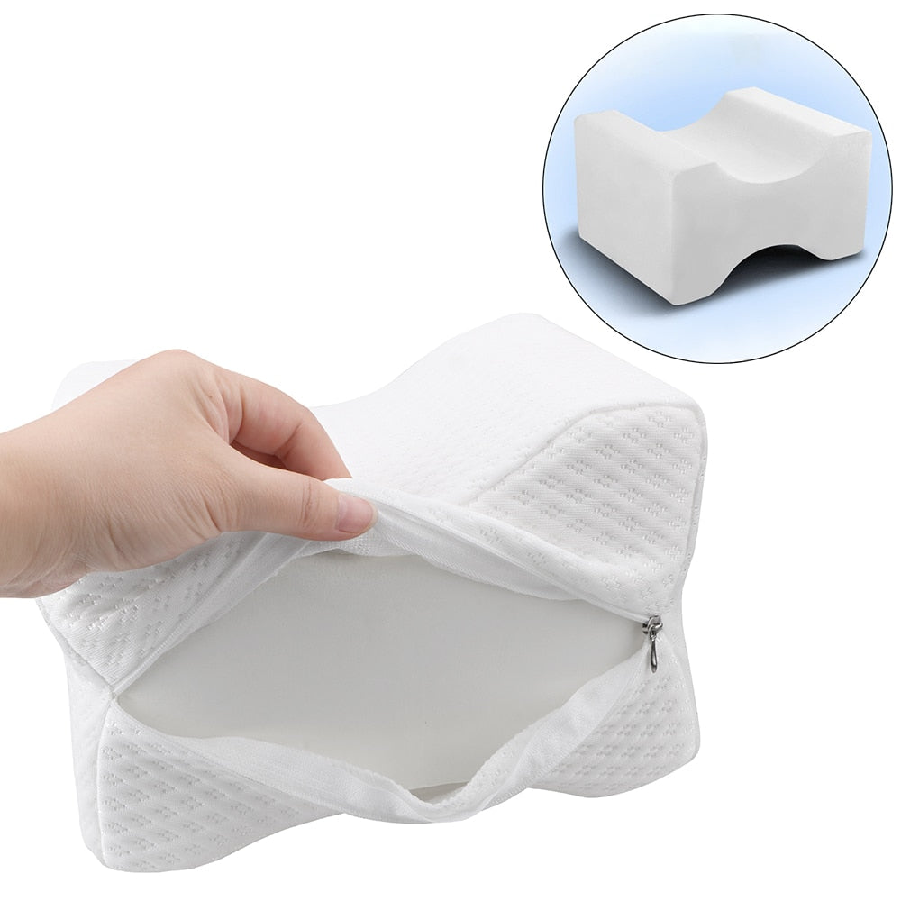 Orthopaedic cushion, white memory foam, ergonomically contoured for hip, knee, and back pain relief, size 24x21x14.5 cm.