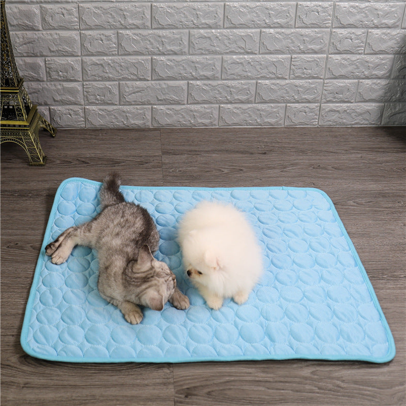 Pet cooling mat in calming colors, offers instant cooling relief with soft padding for pets indoors and outdoors.