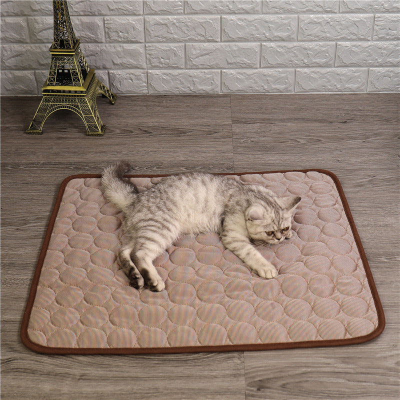 Pet cooling mat in calming colors, offers instant cooling relief with soft padding for pets indoors and outdoors.