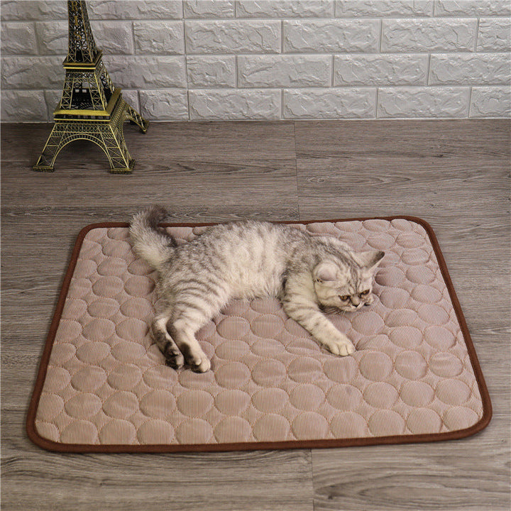 Pet cooling mat in calming colors, offers instant cooling relief with soft padding for pets indoors and outdoors.