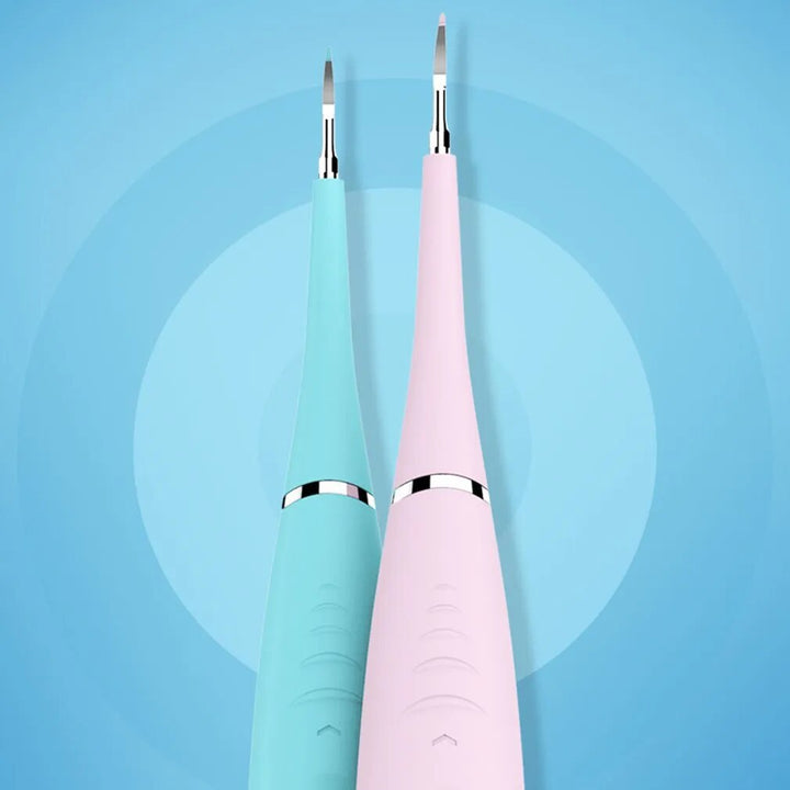 "Pink ultrasonic tooth cleaning wand with adjustable intensity levels, sleek design, portable for effective at-home dental ca