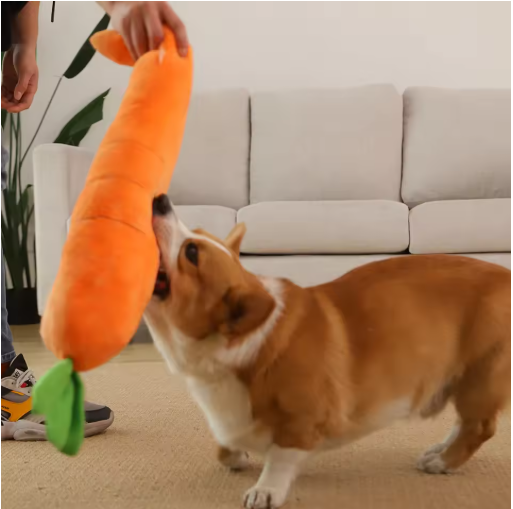 Plush carrot dog toy with soft orange fabric, green leafy top, durable squeaker; perfect for play and snuggles.