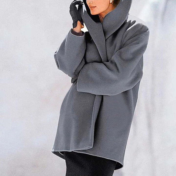 Red women’s wool coat with wide collar, A-line silhouette, perfect for winter, chic and warm, stylish outerwear.