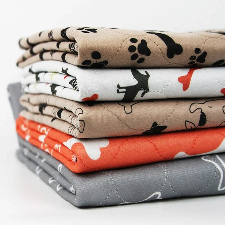 Reusable dog pee pad with paw and bone pattern, thick absorbent layer, eco-friendly, washable, ideal for pet use.