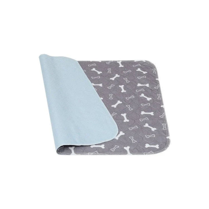 Reusable dog pee pad with paw and bone pattern, thick absorbent layer, eco-friendly, washable, ideal for pet use.