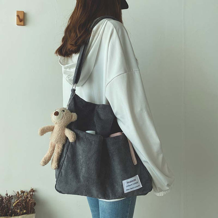 Ribbed velvet shoulder bag in beige, black, brown, green, grey with spacious interior for stylish, organized essentials.