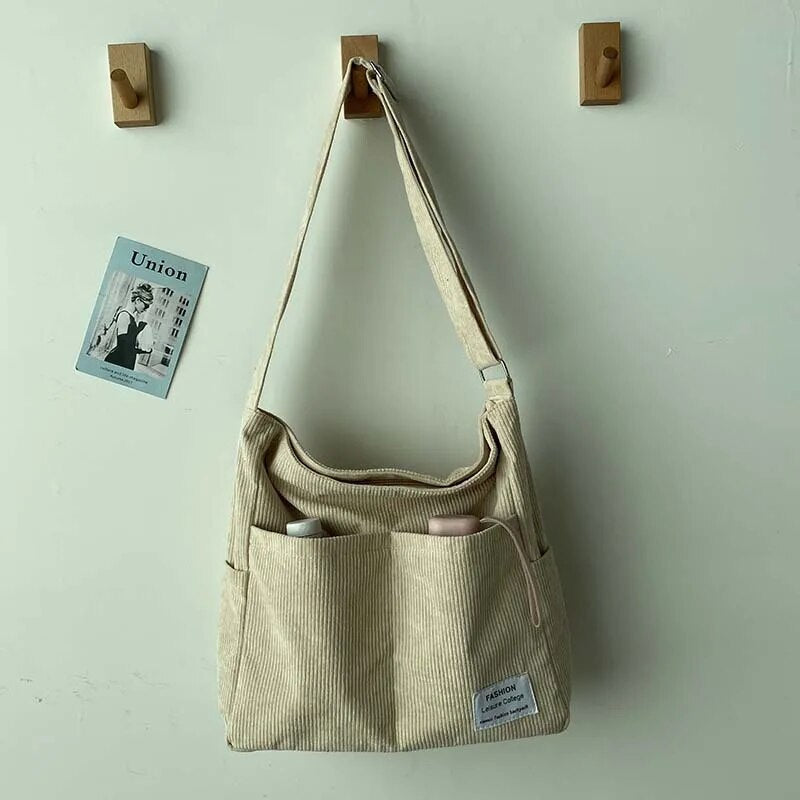 Ribbed velvet shoulder bag in beige, black, brown, green, grey with spacious interior for stylish, organized essentials.