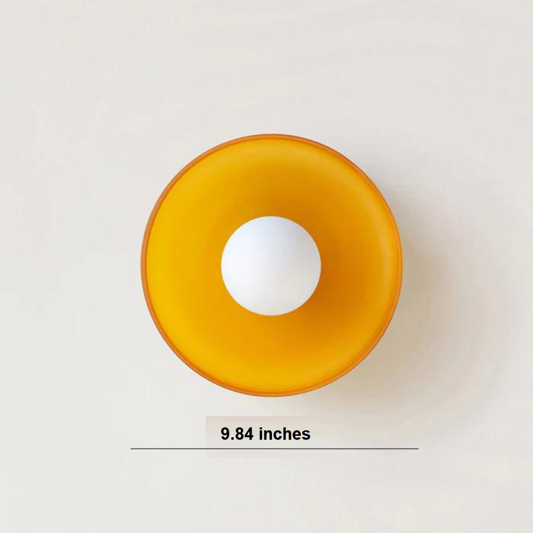 "Round ceiling lamp of high-quality glass in vibrant orange, stylish design, perfect for modern interiors, enhancing any spac