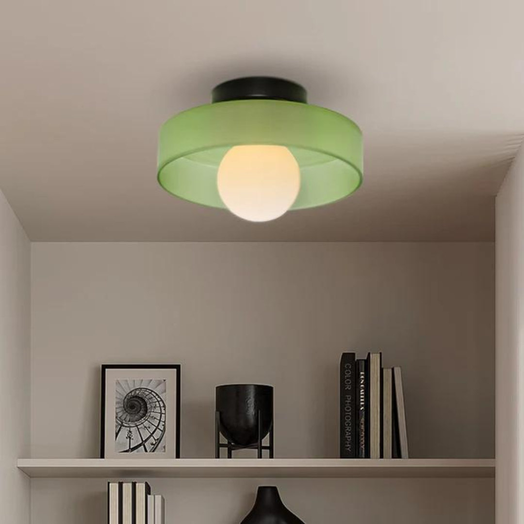 "Round ceiling lamp of high-quality glass in vibrant orange, stylish design, perfect for modern interiors, enhancing any spac