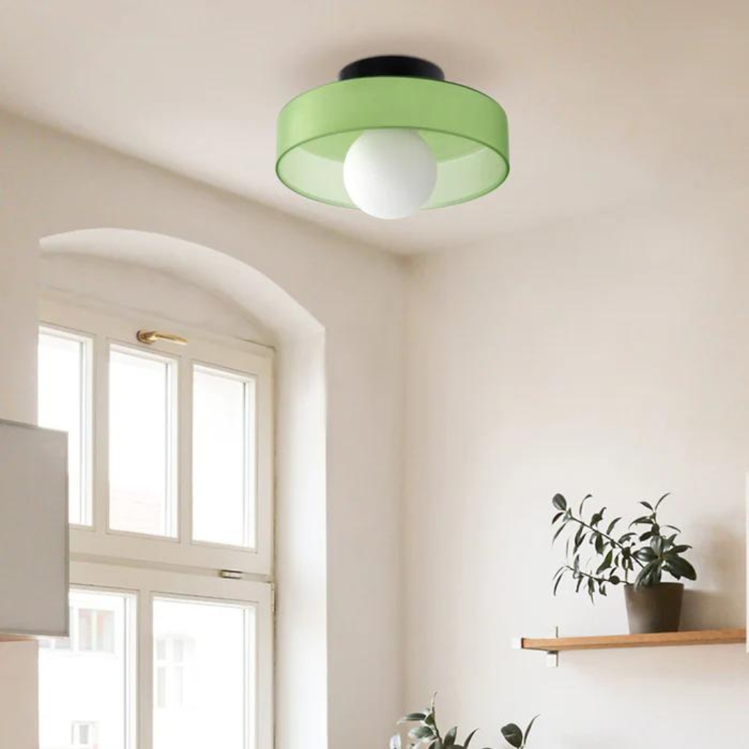 "Round ceiling lamp of high-quality glass in vibrant orange, stylish design, perfect for modern interiors, enhancing any spac