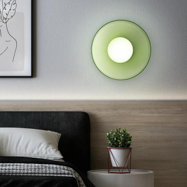 "Round ceiling lamp of high-quality glass in vibrant orange, stylish design, perfect for modern interiors, enhancing any spac