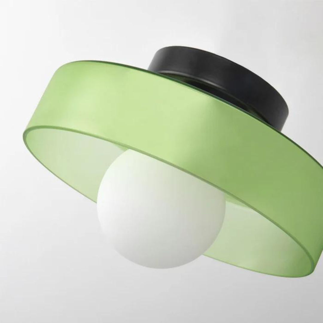 "Round ceiling lamp of high-quality glass in vibrant orange, stylish design, perfect for modern interiors, enhancing any spac