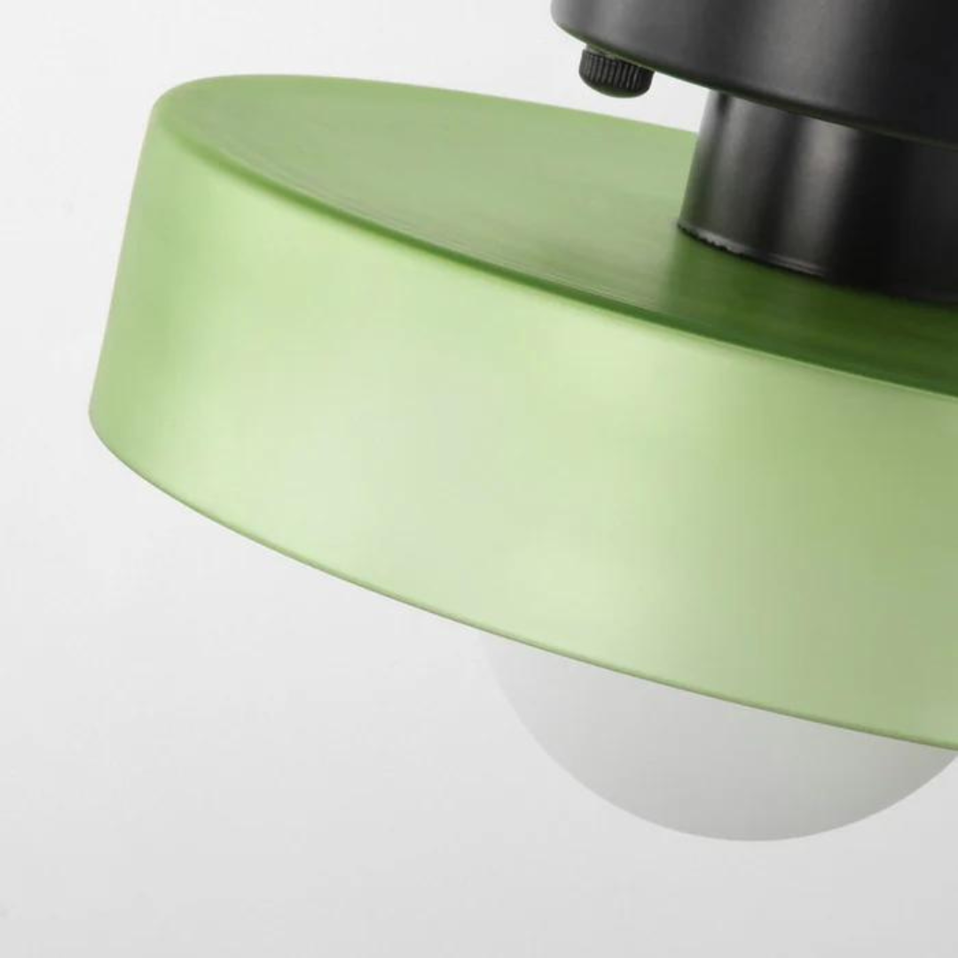 "Round ceiling lamp of high-quality glass in vibrant orange, stylish design, perfect for modern interiors, enhancing any spac