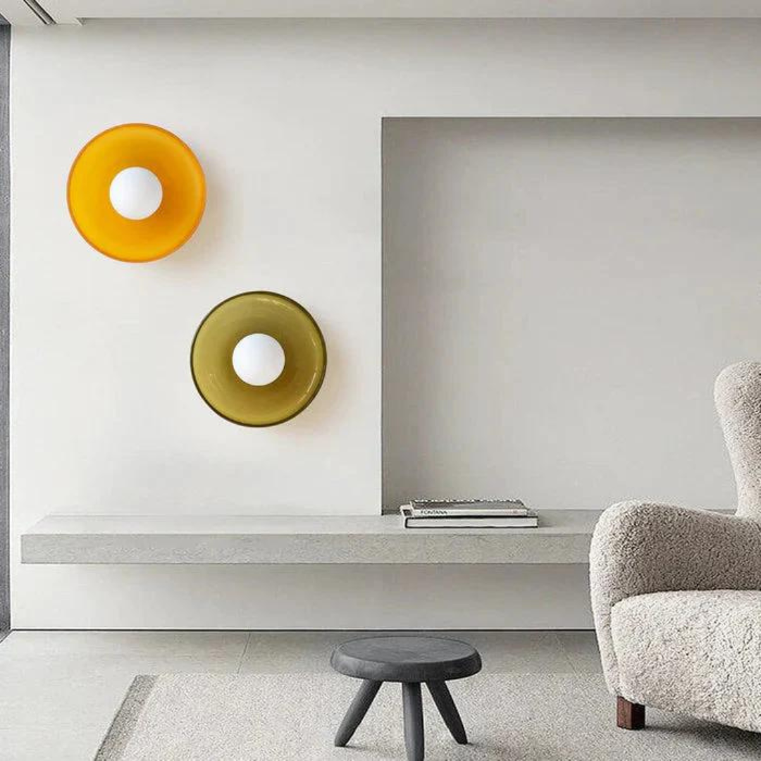"Round ceiling lamp of high-quality glass in vibrant orange, stylish design, perfect for modern interiors, enhancing any spac