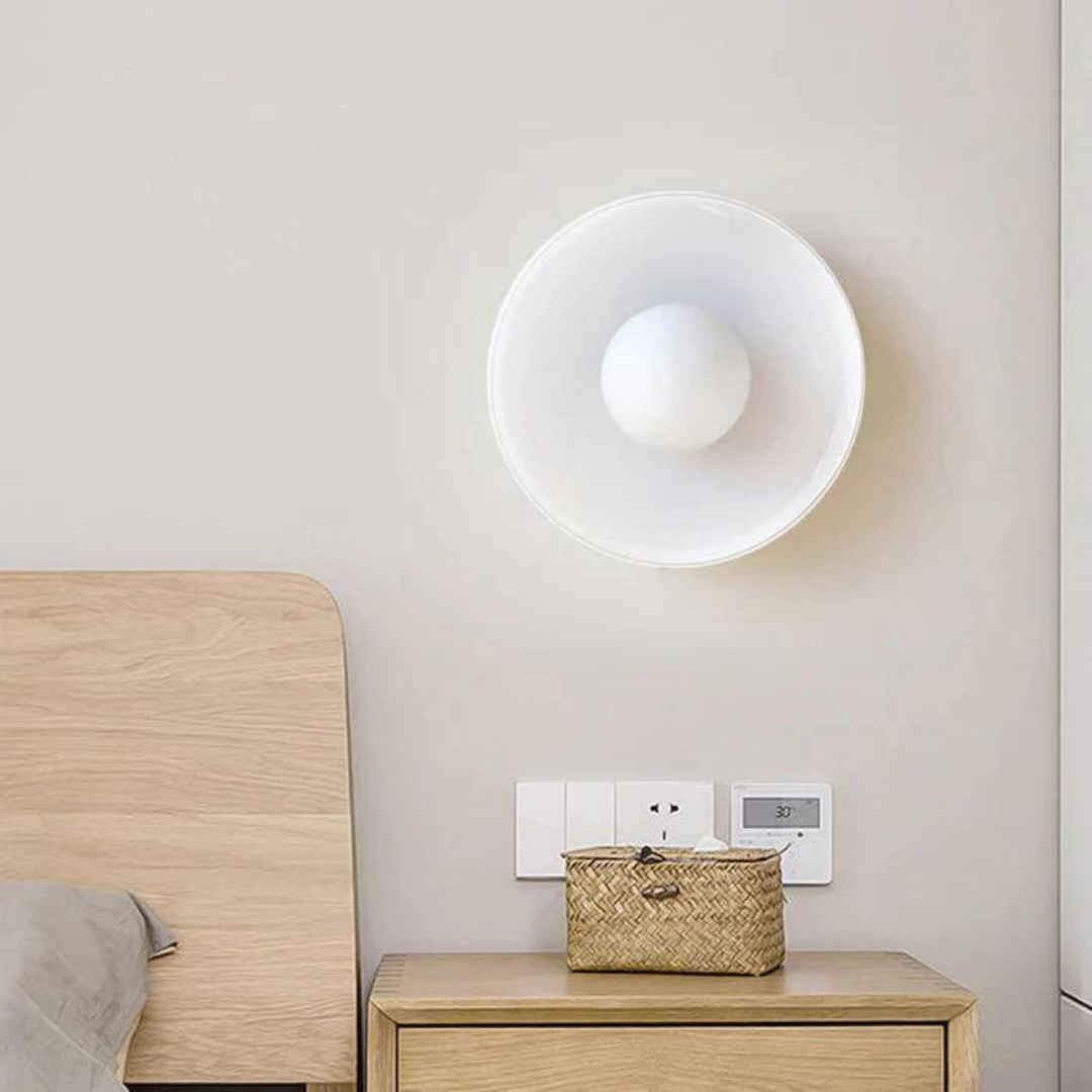 "Round ceiling lamp of high-quality glass in vibrant orange, stylish design, perfect for modern interiors, enhancing any spac