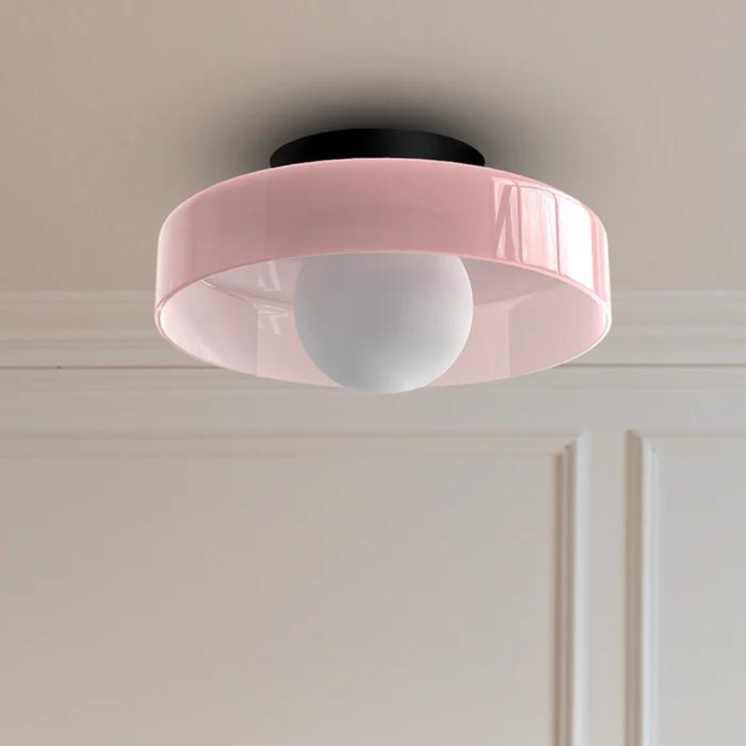 "Round ceiling lamp of high-quality glass in vibrant orange, stylish design, perfect for modern interiors, enhancing any spac