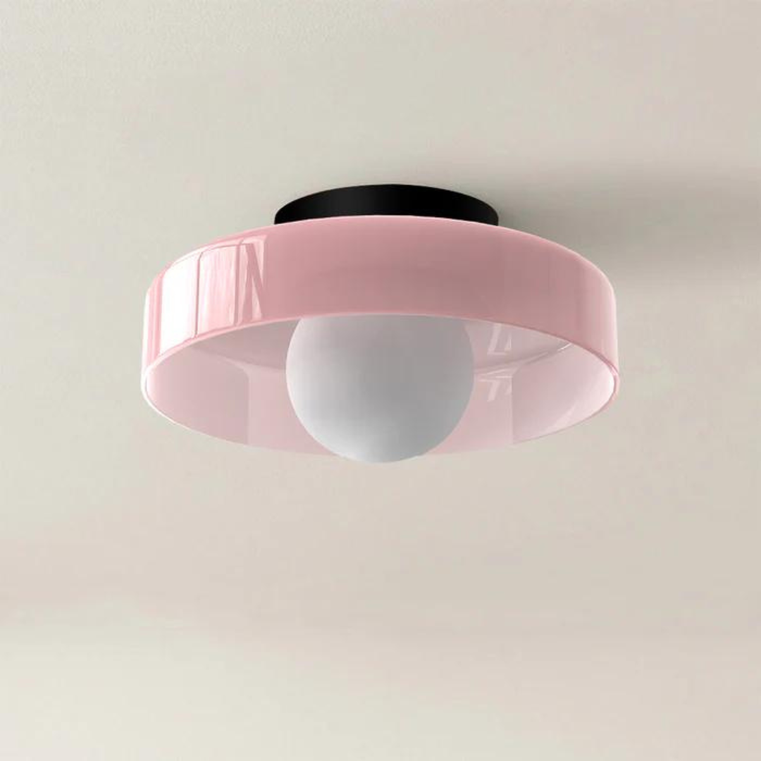 "Round ceiling lamp of high-quality glass in vibrant orange, stylish design, perfect for modern interiors, enhancing any spac