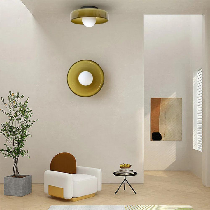 "Round ceiling lamp of high-quality glass in vibrant orange, stylish design, perfect for modern interiors, enhancing any spac