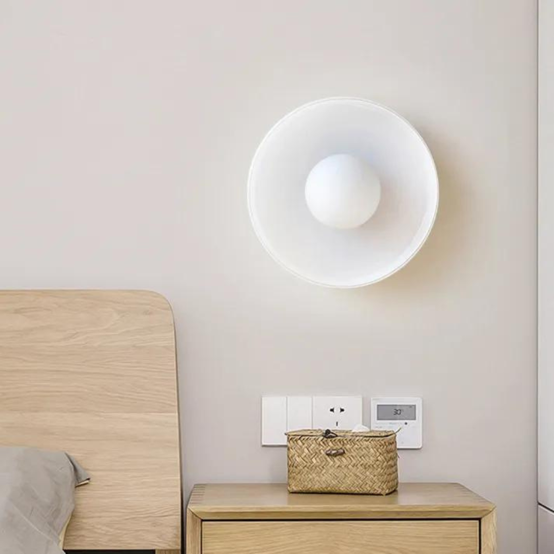 "Round ceiling lamp of high-quality glass in vibrant orange, stylish design, perfect for modern interiors, enhancing any spac