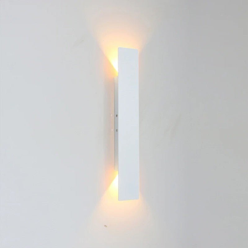 "Sleek black weatherproof LED wall light for outdoor use, featuring modern design and durable aluminum construction."