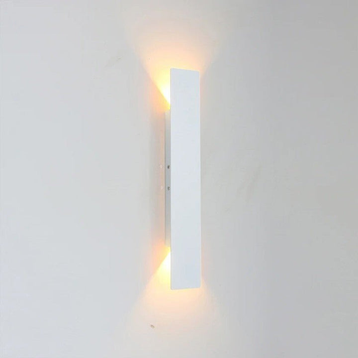 "Sleek black weatherproof LED wall light for outdoor use, featuring modern design and durable aluminum construction."