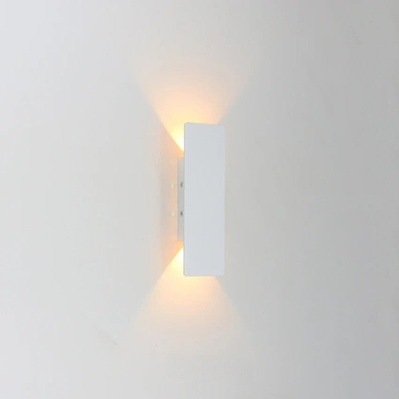 "Sleek black weatherproof LED wall light for outdoor use, featuring modern design and durable aluminum construction."