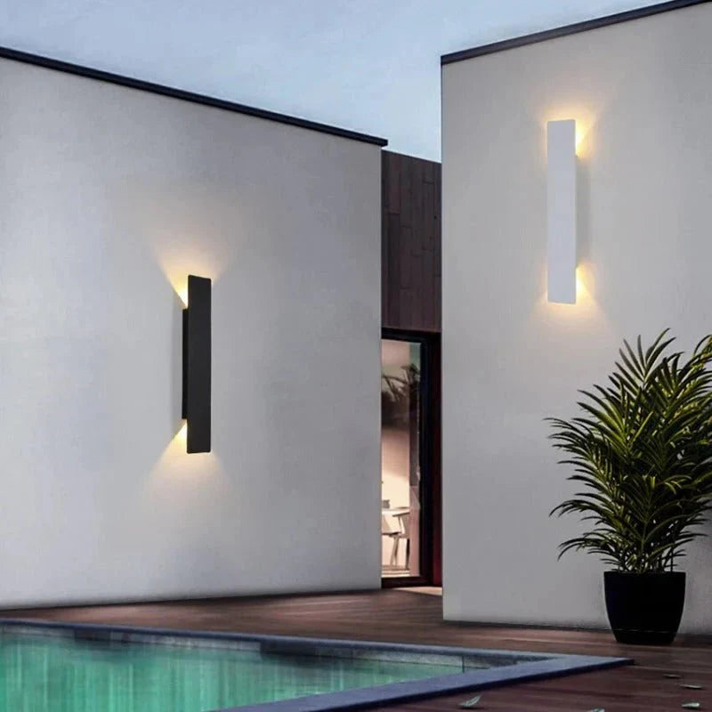 "Sleek black weatherproof LED wall light for outdoor use, featuring modern design and durable aluminum construction."