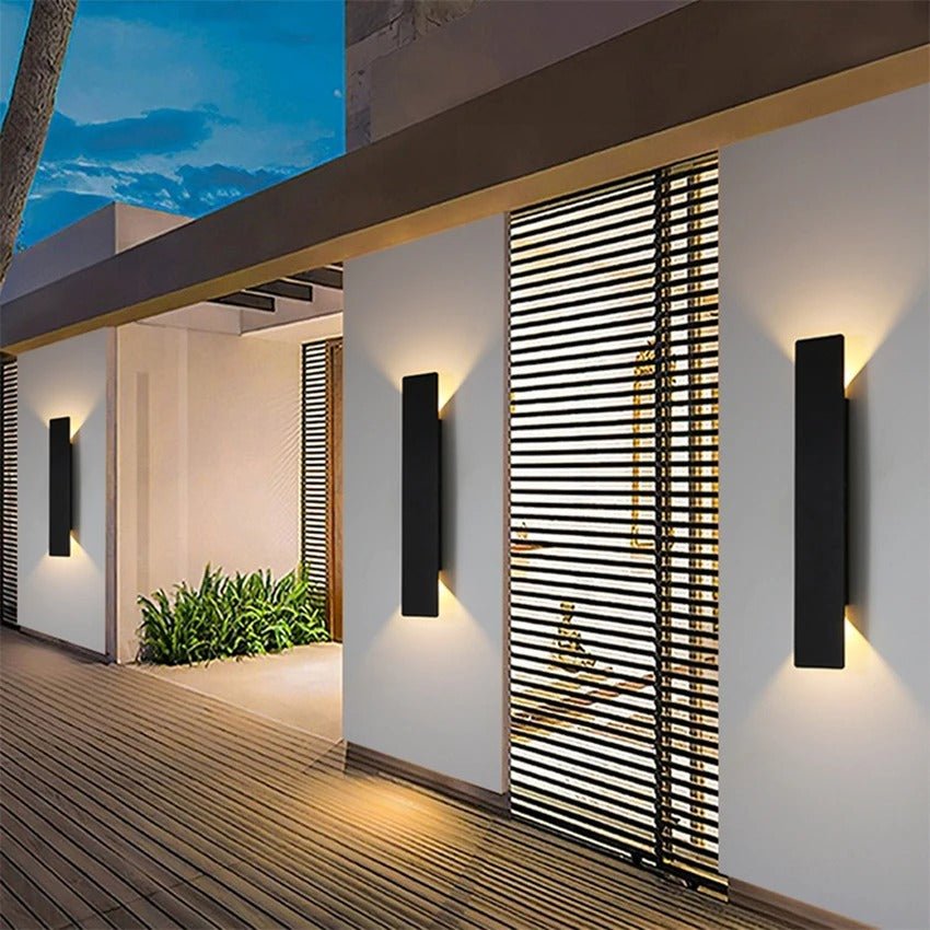 "Sleek black weatherproof LED wall light for outdoor use, featuring modern design and durable aluminum construction."