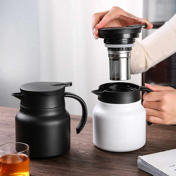 "Stainless steel insulation pot, polished finish, spill-proof jug, V-spout, integrated handle, sleek thermal design"