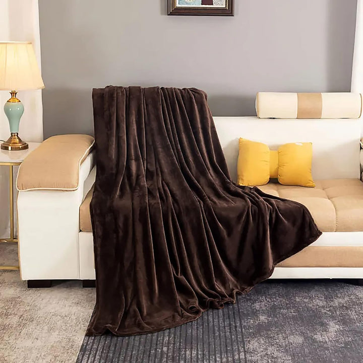 "Ultra-soft faux fur large sofa throw blanket in light grey, adding warmth and style to any living space, perfect for cozy de