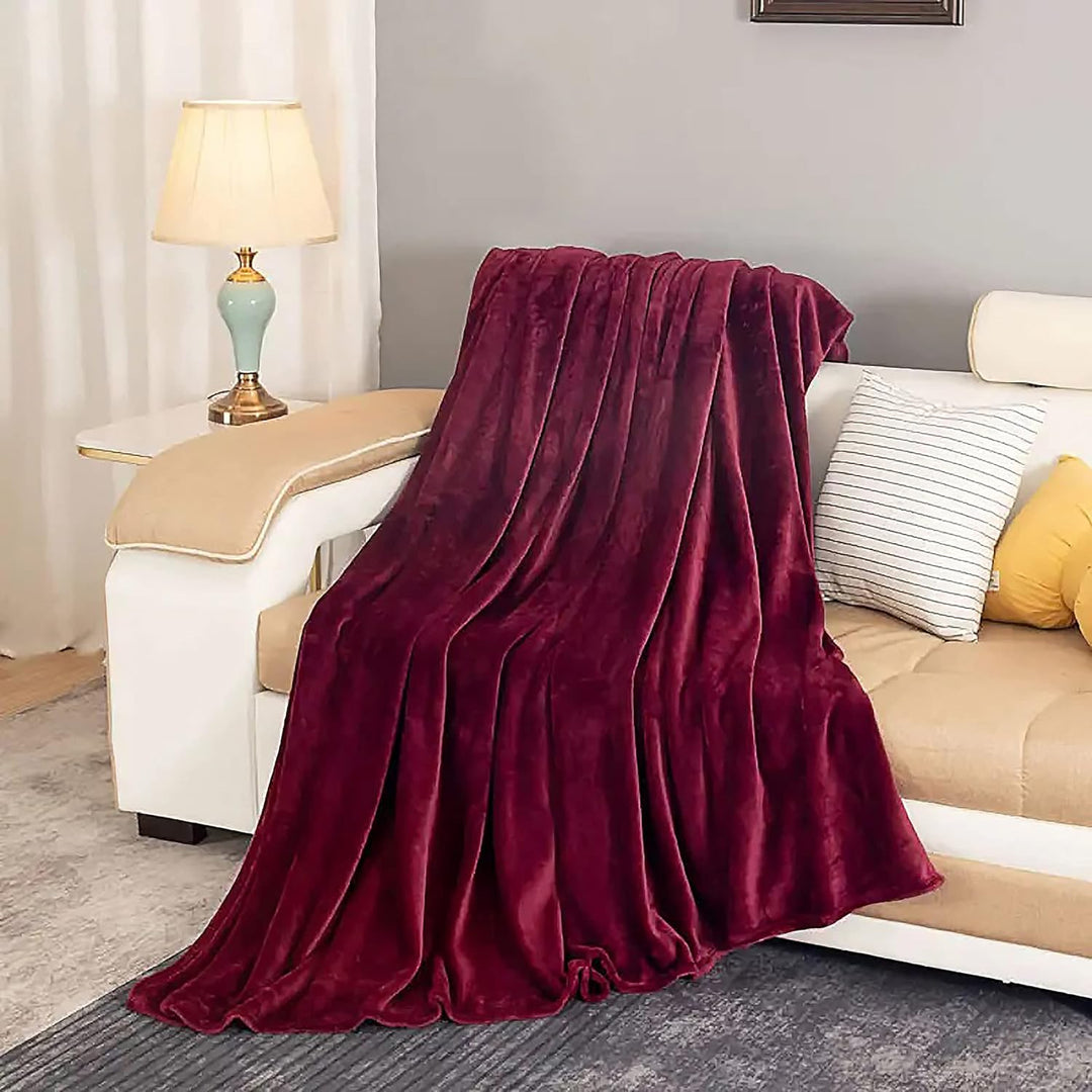 "Ultra-soft faux fur large sofa throw blanket in light grey, adding warmth and style to any living space, perfect for cozy de