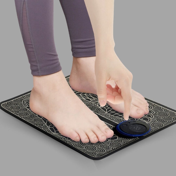 Unisex EMS foot massage mat for pain relief, black textured surface, portable and lightweight, promotes circulation and relax