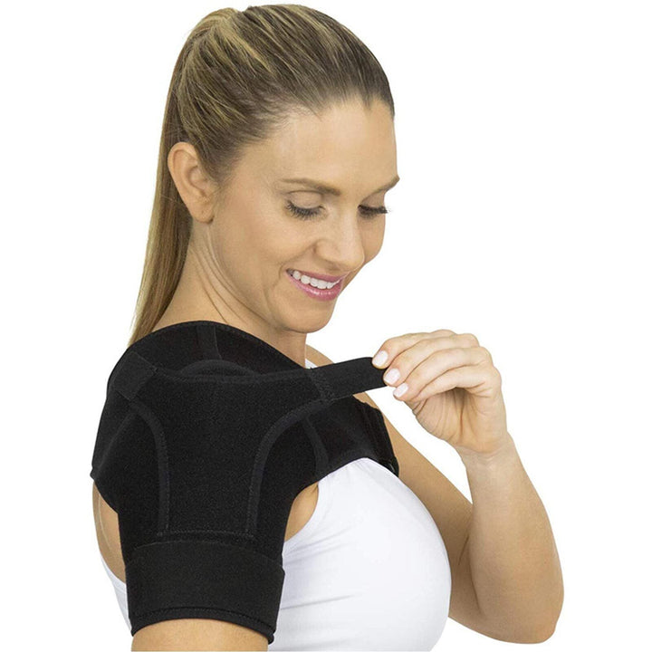 Unisex adjustable neoprene shoulder brace with breathable material, ergonomic design for pain relief and support.