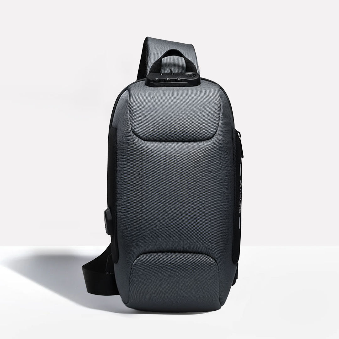 "Unisex anti-theft crossbody bag with USB charging, slash-proof strap, lockable compartment, and hardshell exterior in black.